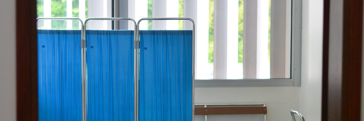 Three panel privacy screens shown on a hospital ward