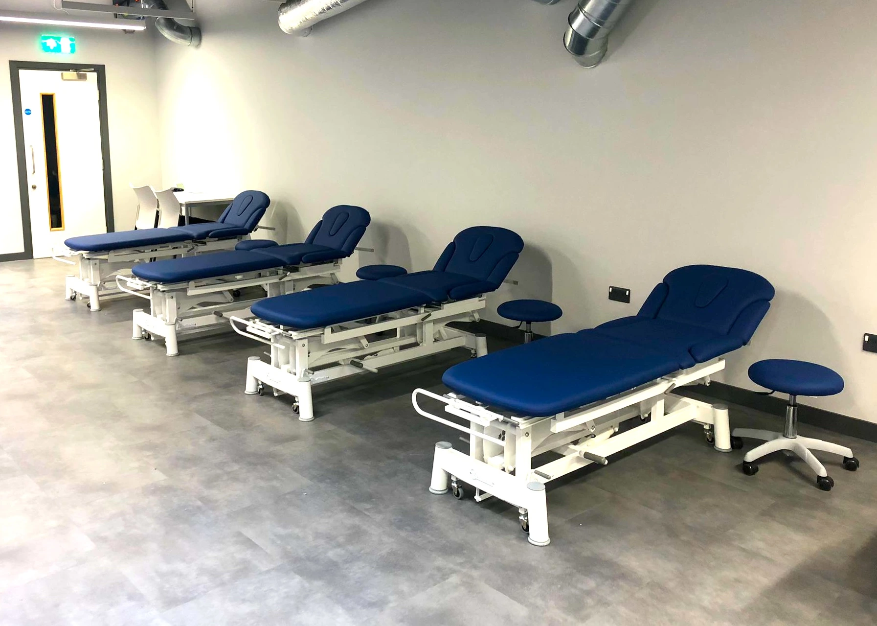 Medical couches and stools by Meditelle shown at a facility in South Essex College